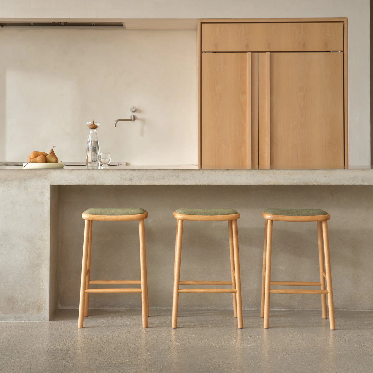 iconbydesign-anton-bar-stool-oak-aloe-green-fabric--DF8FA1--lifestyle-3.webp