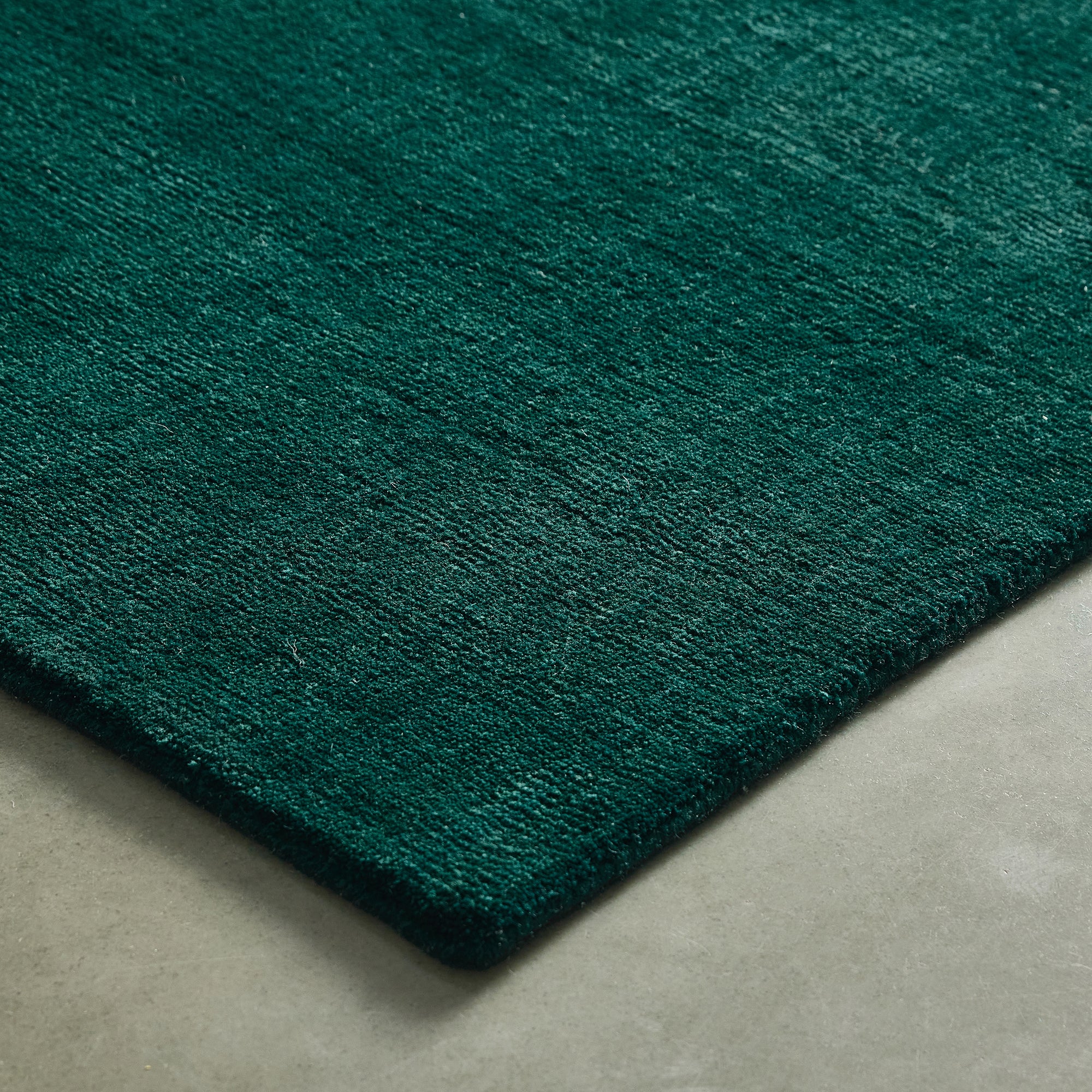 iconbydesign-freya-nz-wool-rug-ocean-teal-studio-detail-corner_gw3xaa.jpg