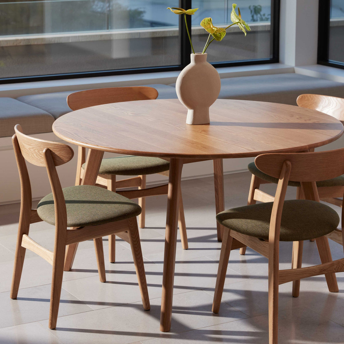 iconbydesign-magnus-dining-chair-oak-aloe-green-fabric--DF2FA1--lifestyle.jpg