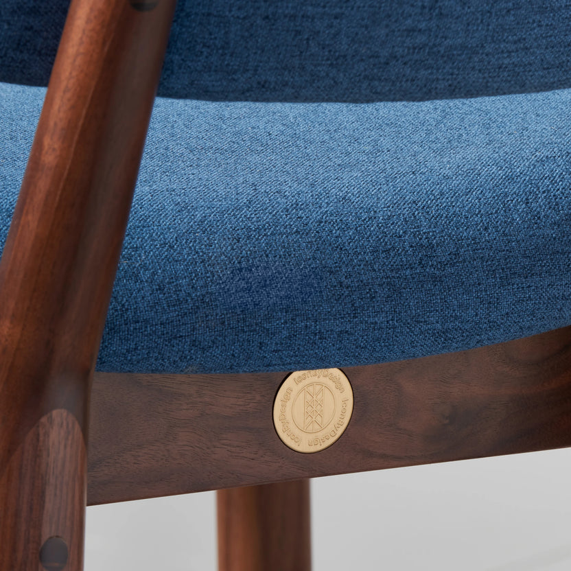 iconbydesign-olivia-dining-chair-walnut-denim-blue-fabric--DF3MB1--studio-d_detail-medallion.webp