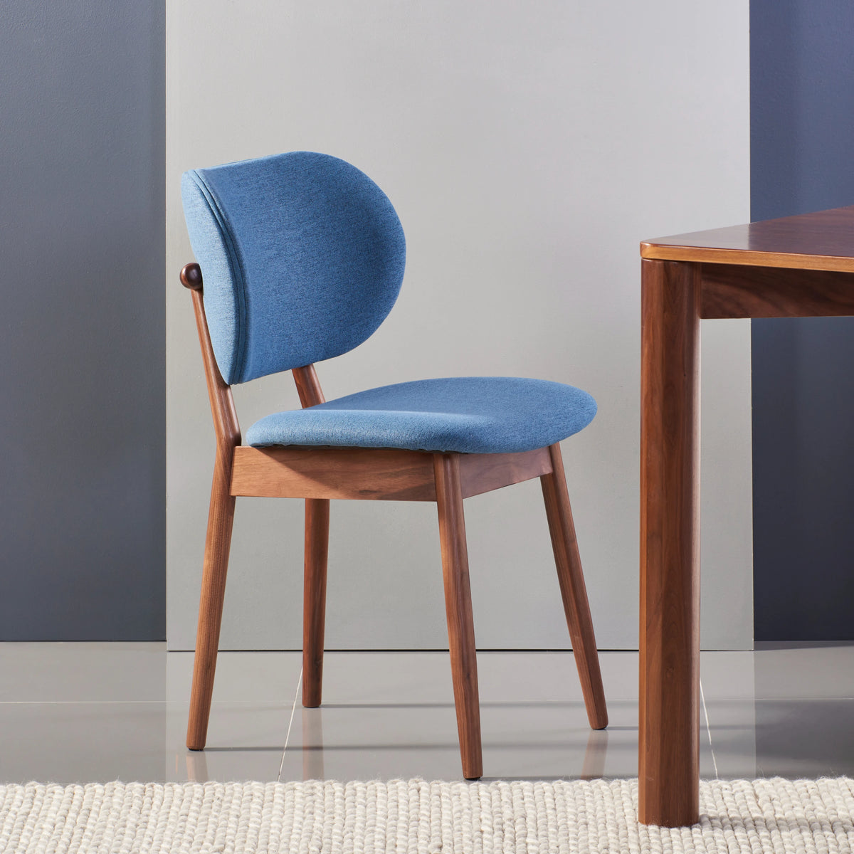 iconbydesign-olivia-dining-chair-walnut-denim-blue-fabric--DF3MB1--studio-d_staged-front-right.webp