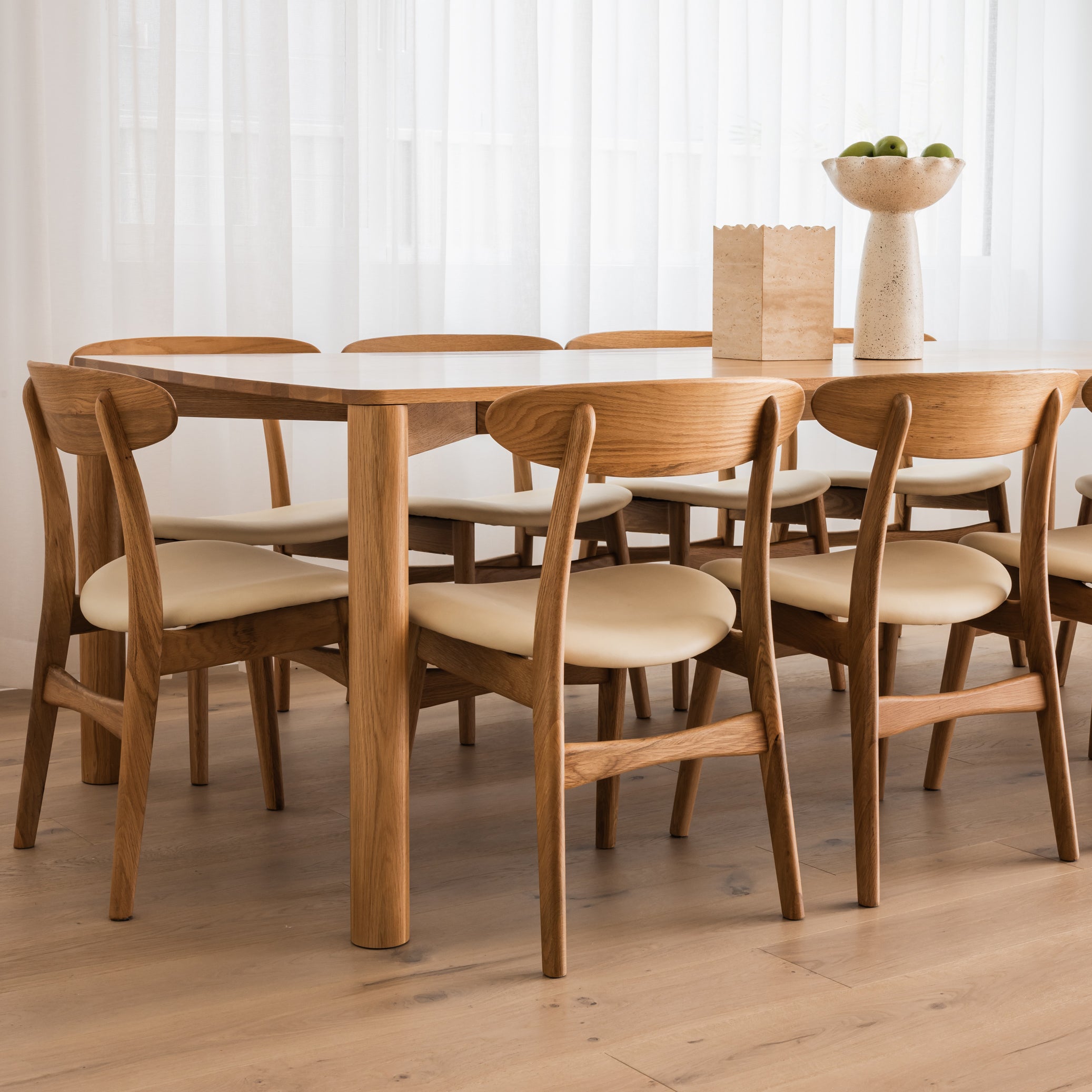 magnus-dining-chair-cream-leather-oak-olivia_table-DF2HA1-OS1008-lifestyle-2_sq.jpg