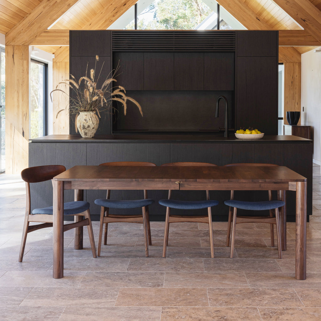 olivia-extendable-190-240cm-dining-table-magnus-dining-chair-walnut-chambray-blue-fabric--SHARED--lifestyle-3-sq.jpg