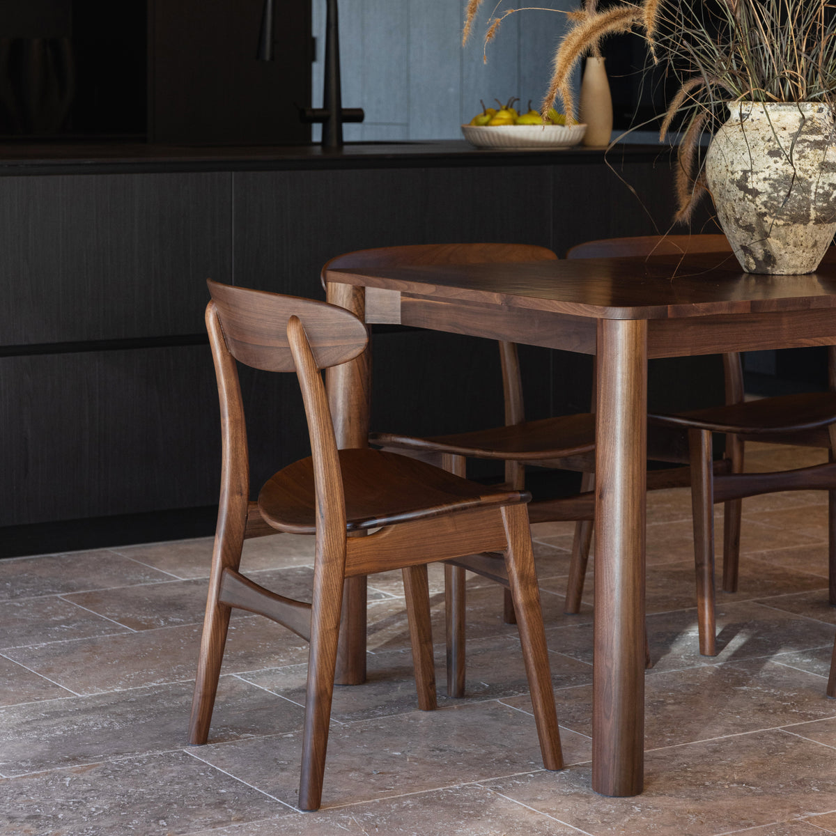 olivia-extendable-dining-table-magnus-chair-walnut--SHARED--lifestyle-1-sq.jpg